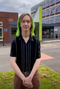 Michael Blamey smiling outside the college